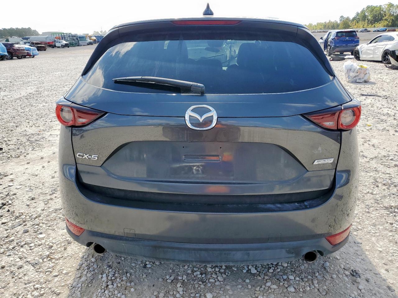 2018 Mazda Cx-5 Touring VIN: JM3KFACM9J1445125 Lot: 91349525