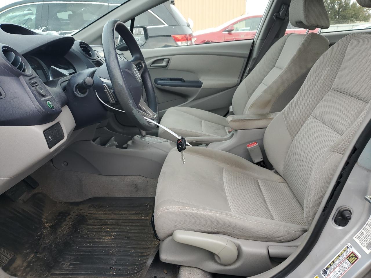 2010 Honda Insight Ex VIN: JHMZE2H77AS009465 Lot: 92197905