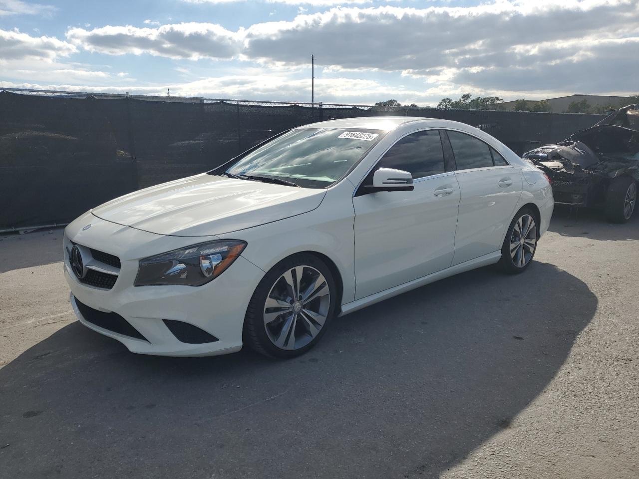 2016 Mercedes-Benz Cla 250 4Matic white sedan gas WDDSJ4GB4GN389863 photo #1