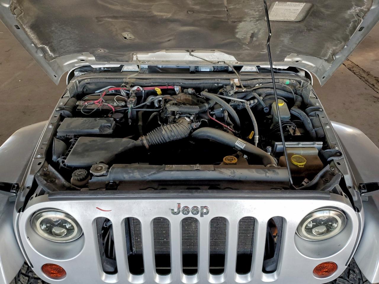 2007 Jeep Wrangler Sahara VIN: 1J8GA59127L140976 Lot: 94215415