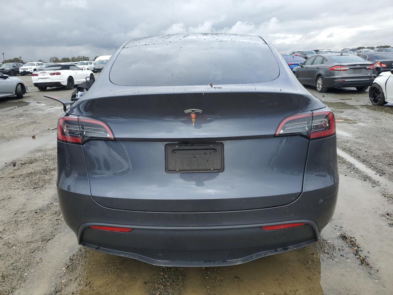 2023 Tesla Model Y VIN: 7SAYGDED0PF945725 Lot: 93749315