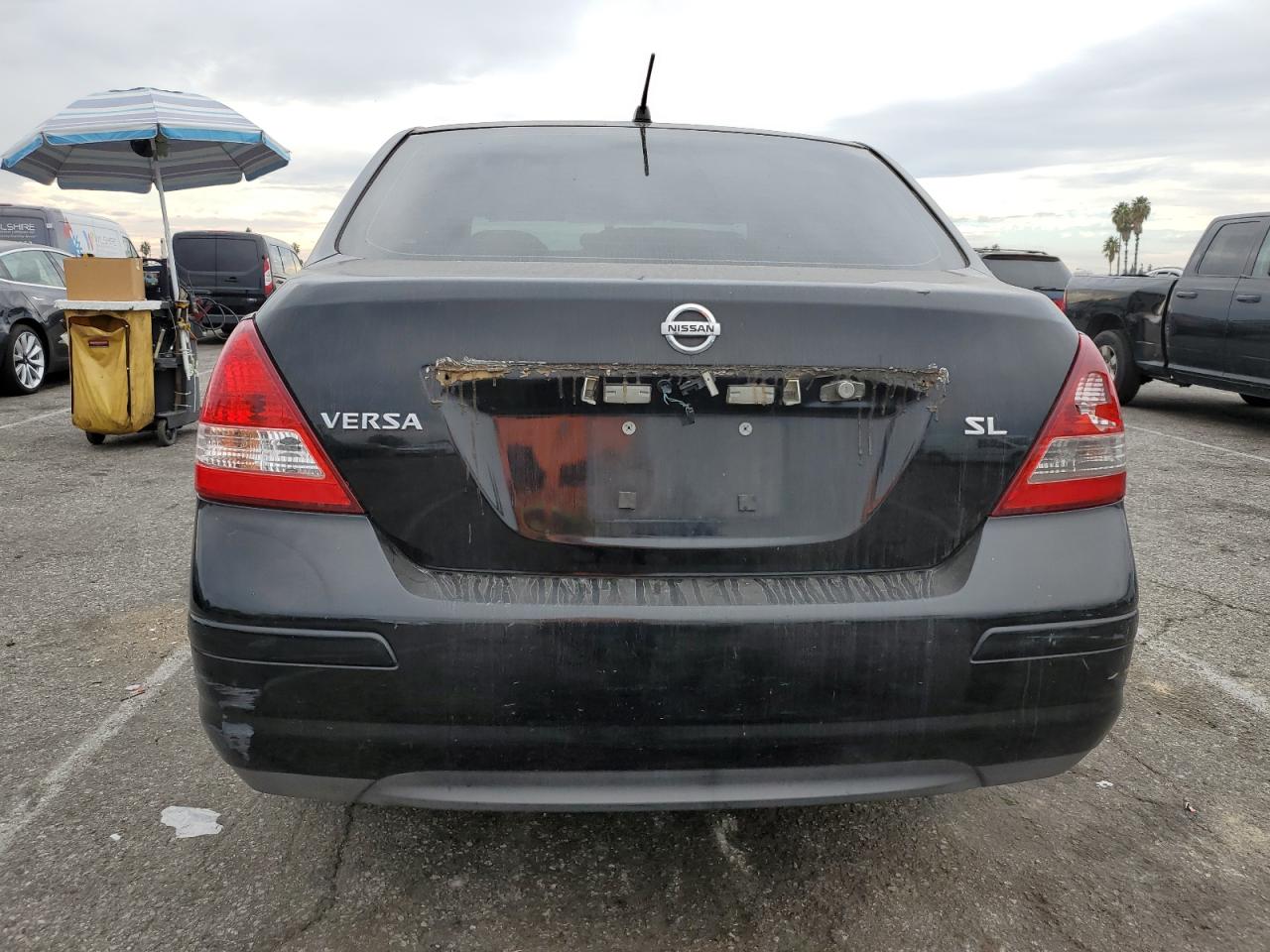 2007 Nissan Versa S VIN: 3N1BC11E77L438062 Lot: 91741505