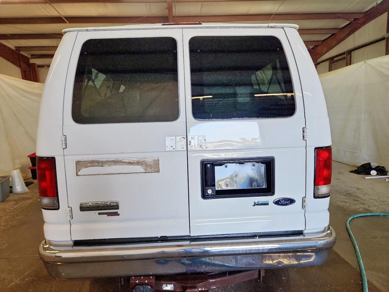 2009 Ford Econoline E350 Super Duty Wagon VIN: 1FBNE31LX9DA87711 Lot: 92680635