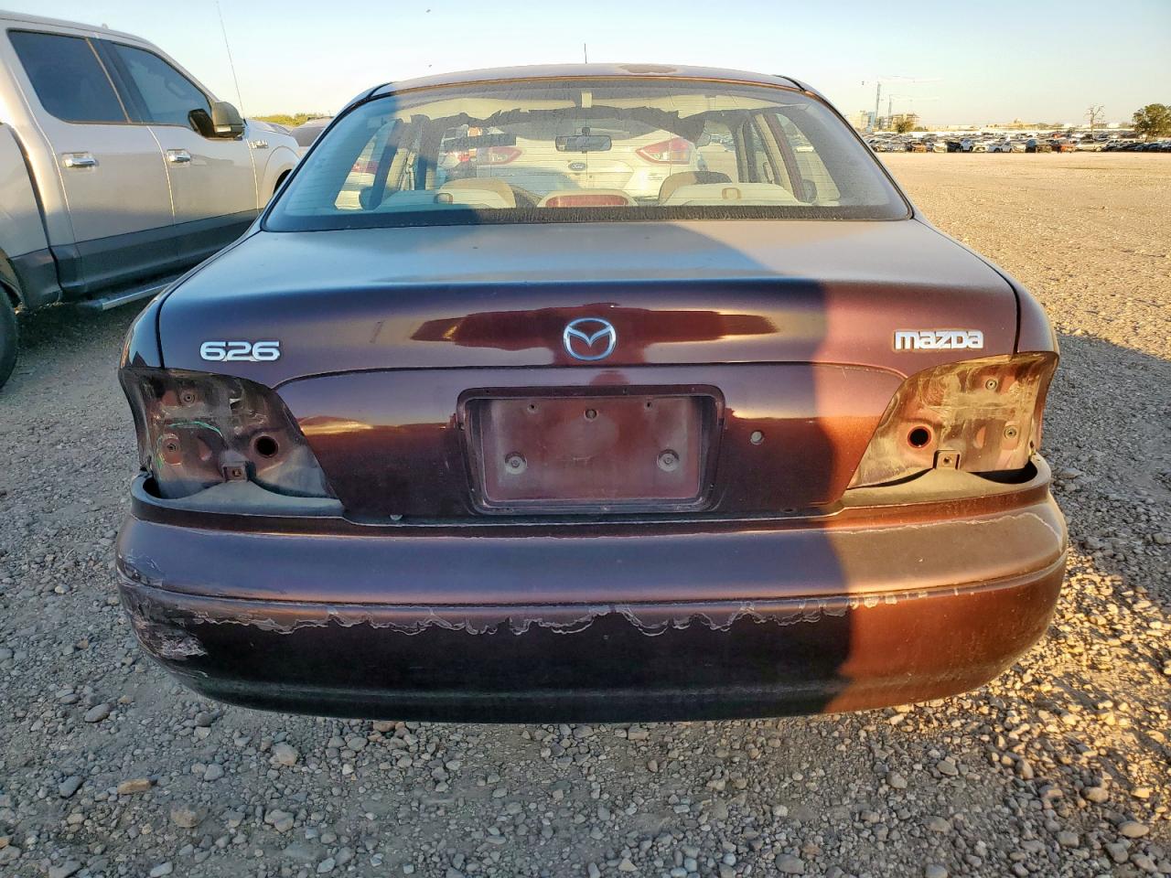 2002 Mazda 626 Lx VIN: 1YVGF22C225299300 Lot: 91440235