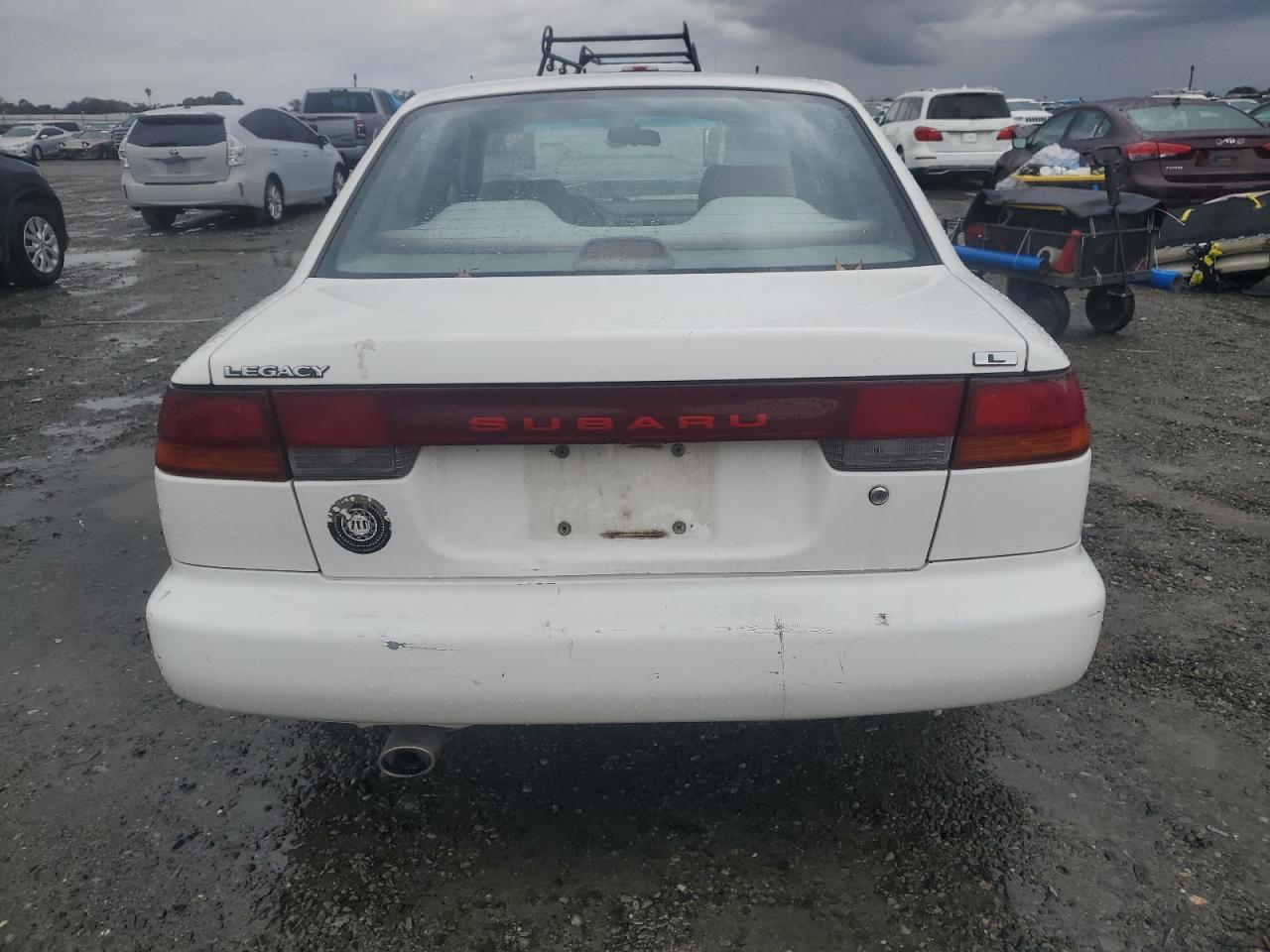 1995 Subaru Legacy L VIN: 4S3BD6357S9213498 Lot: 91594895
