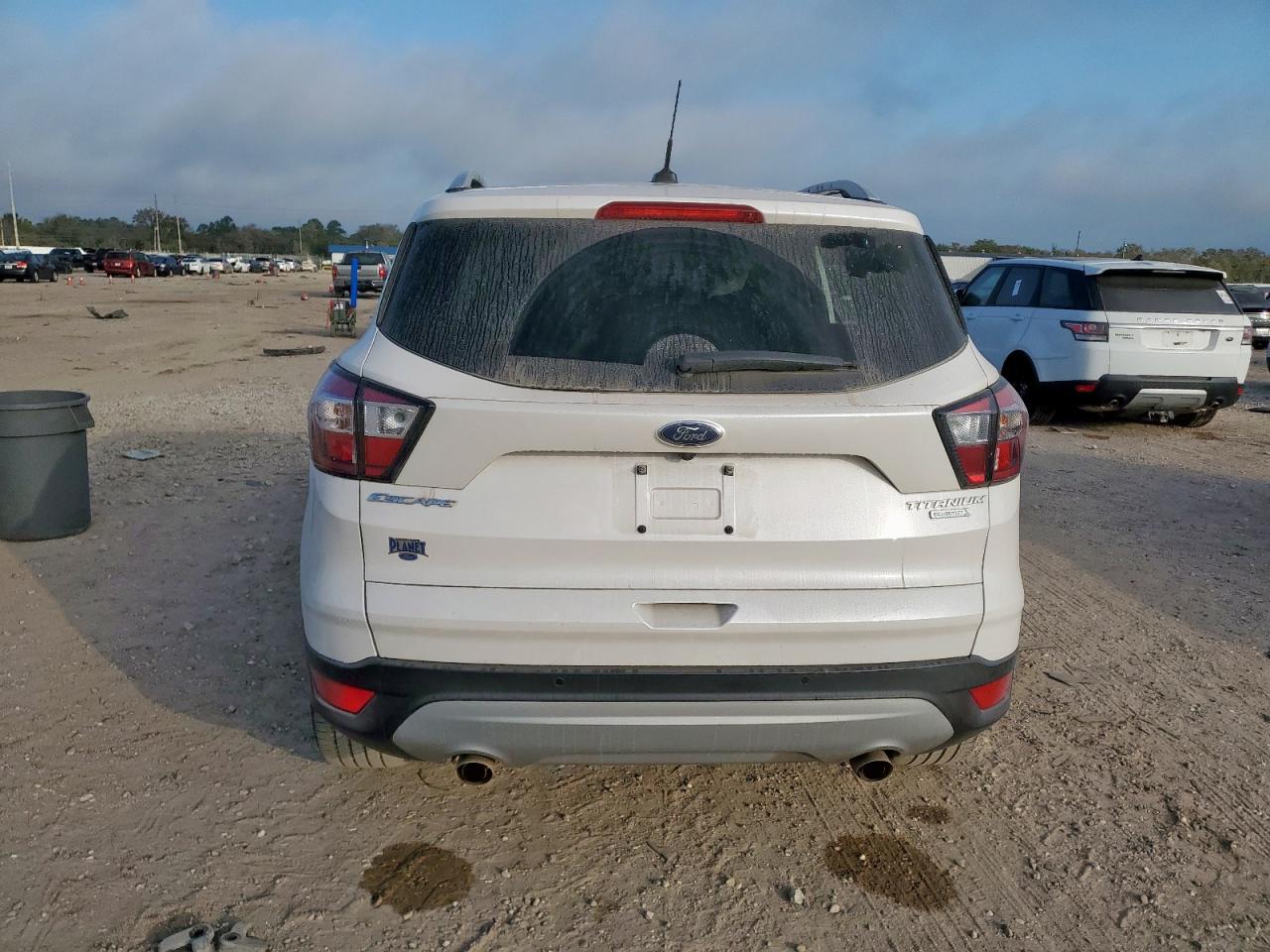 2017 Ford Escape Titanium VIN: 1FMCU0J9XHUC33950 Lot: 91053615