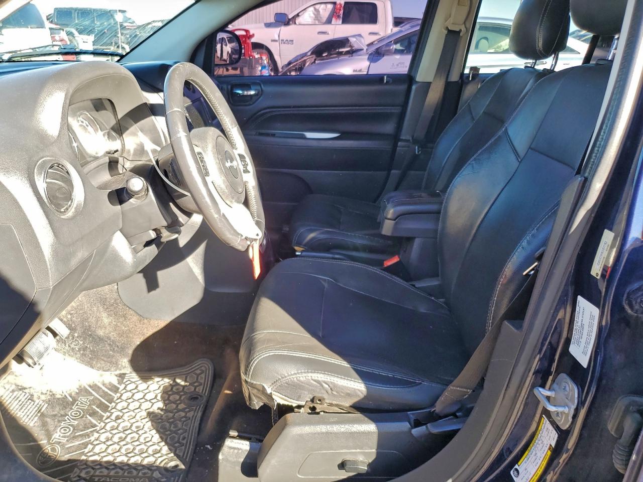 2014 Jeep Compass Limited VIN: 1C4NJCCB9ED877152 Lot: 94217275