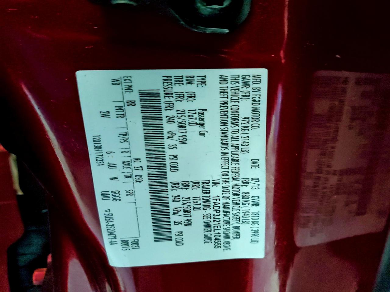 2014 Ford Focus Titanium VIN: 1FADP3J21EL104555 Lot: 94119355