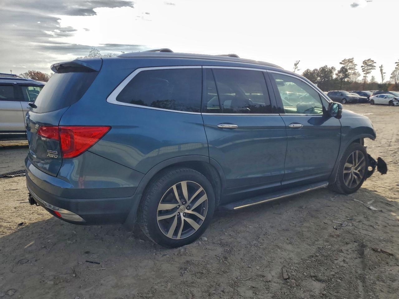 2016 Honda Pilot Touring VIN: 5FNYF6H9XGB082984 Lot: 94058495