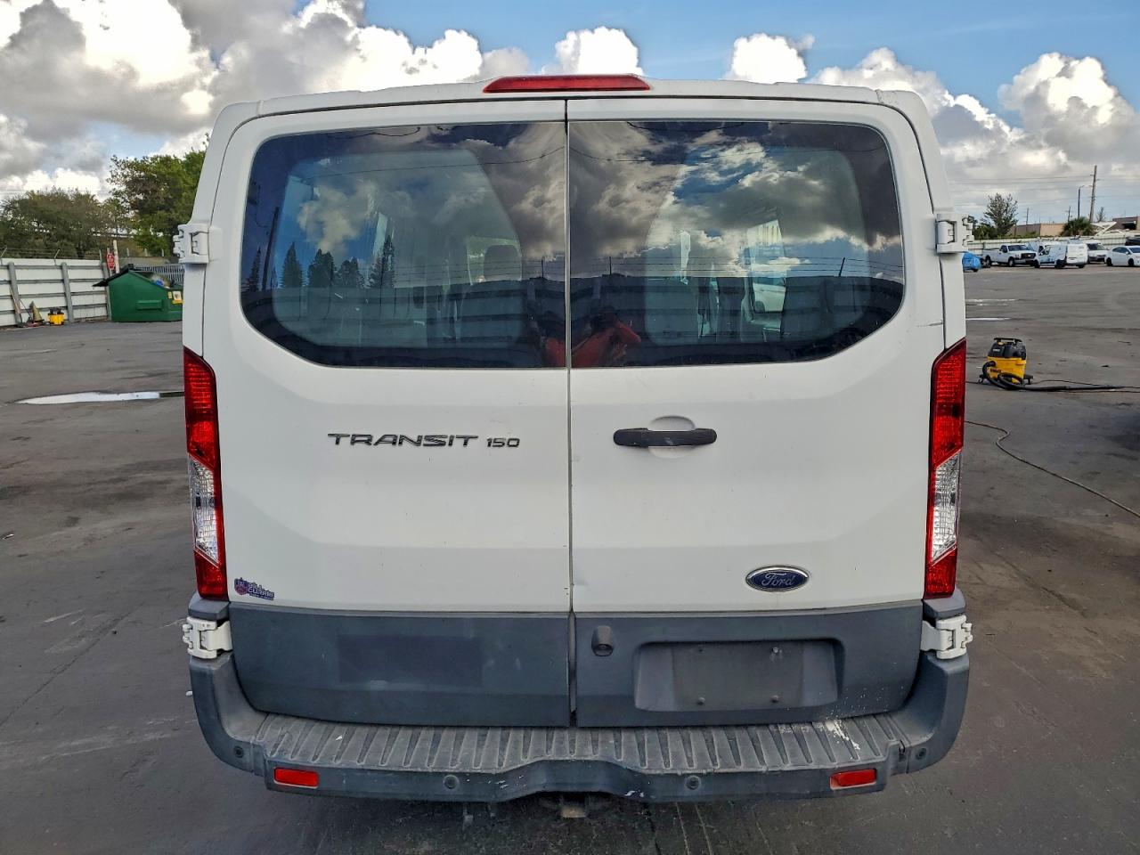 2016 Ford Transit T-150 VIN: 1FTYE1YM2GKB39272 Lot: 94950445