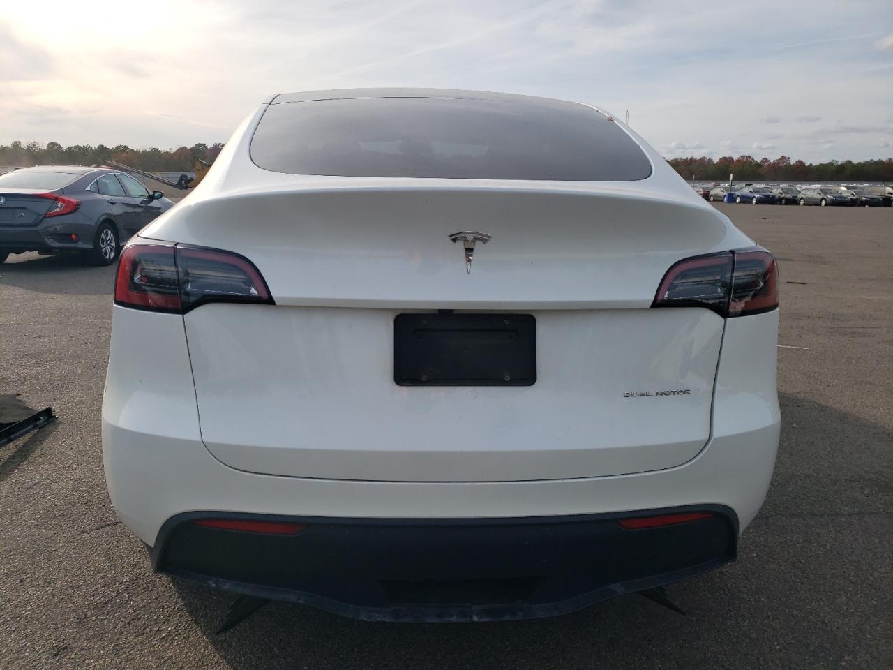 2023 Tesla Model Y VIN: 7SAYGDEE1PF827997 Lot: 90992585