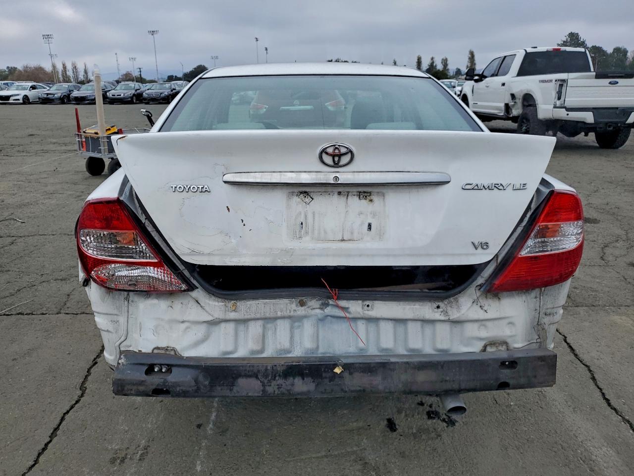2003 Toyota Camry Le VIN: 4T1BF32K73U058963 Lot: 94373195
