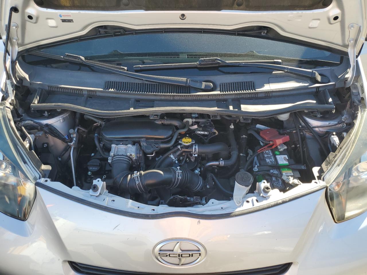 2012 Toyota Scion Iq VIN: JTNJJXB02CJ018629 Lot: 91115535