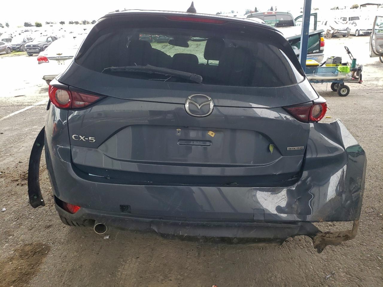 2021 Mazda Cx-5 Touring VIN: JM3KFACM7M0406298 Lot: 94512295