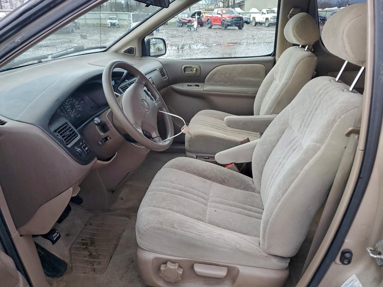 2000 Toyota Sienna Le VIN: 4T3ZF13C2YU270548 Lot: 94310665