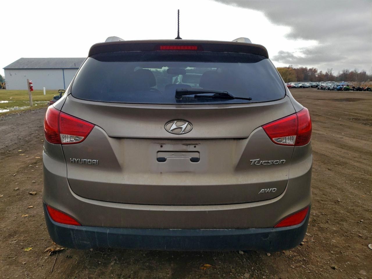 2012 Hyundai Tucson Gls VIN: KM8JUCAC9CU323121 Lot: 94019105
