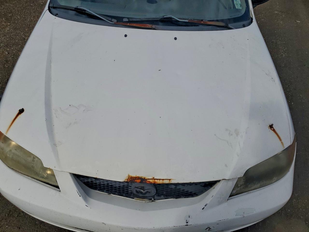 2002 Mazda Protege Dx VIN: JM1BJ225521602092 Lot: 94537785