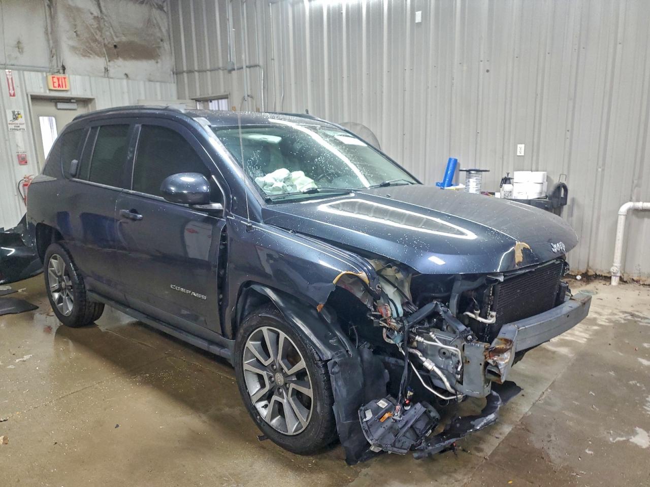 2014 Jeep Compass Limited VIN: 1C4NJCCB1ED652580 Lot: 94750435