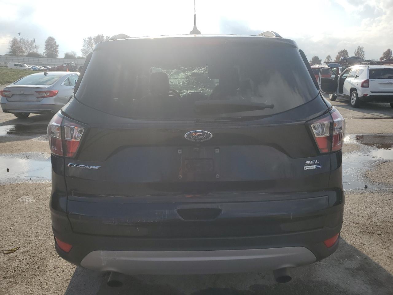 2018 Ford Escape Sel VIN: 1FMCU9HD3JUD18035 Lot: 93254095