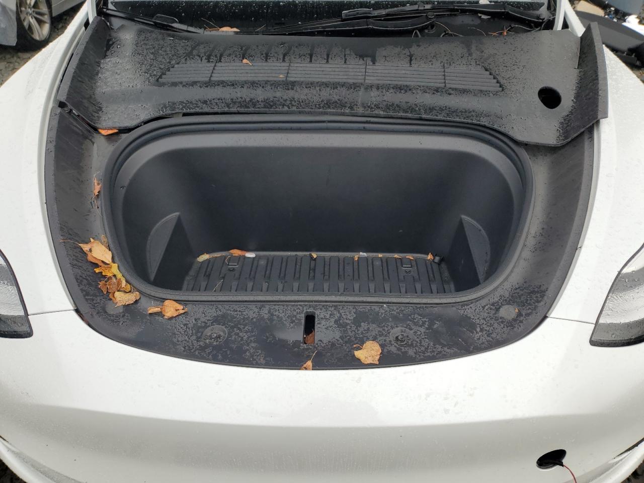 2023 Tesla Model Y VIN: 7SAYGDEE1PA104082 Lot: 92912795