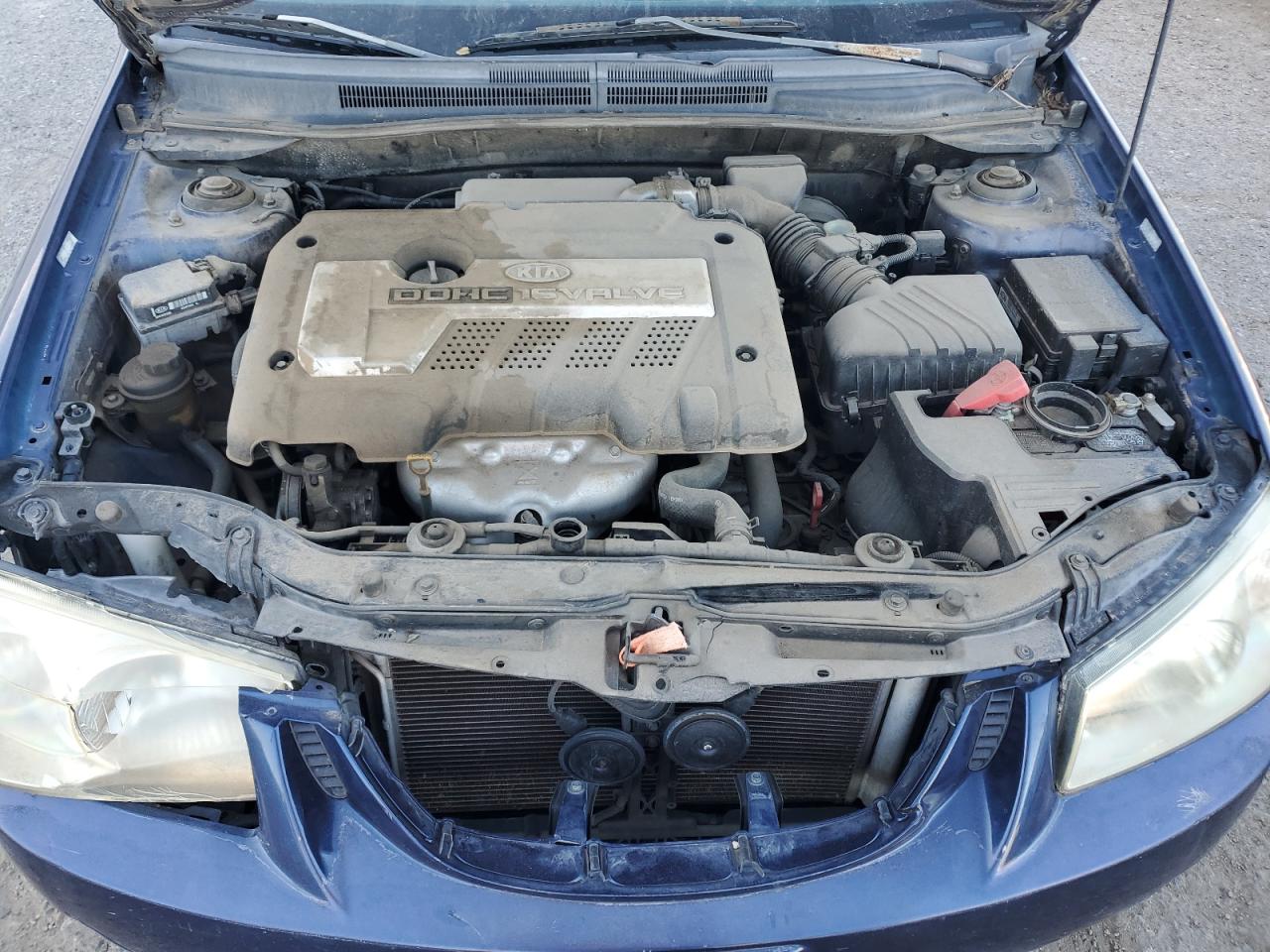 2004 Kia Spectra Lx VIN: KNAFE122745052456 Lot: 90951605