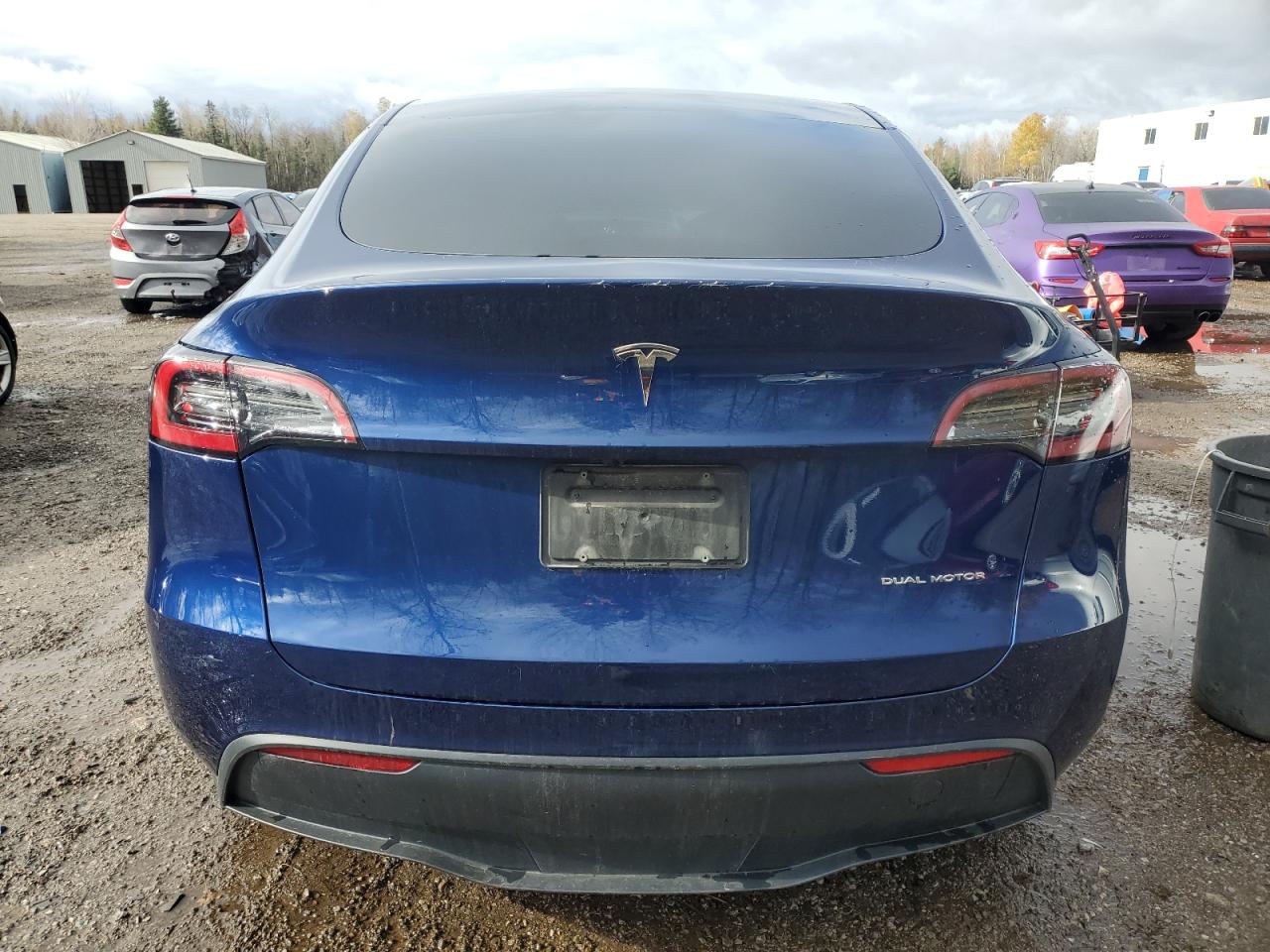 2024 Tesla Model Y VIN: 7SAYGAEEXRF995297 Lot: 91003465