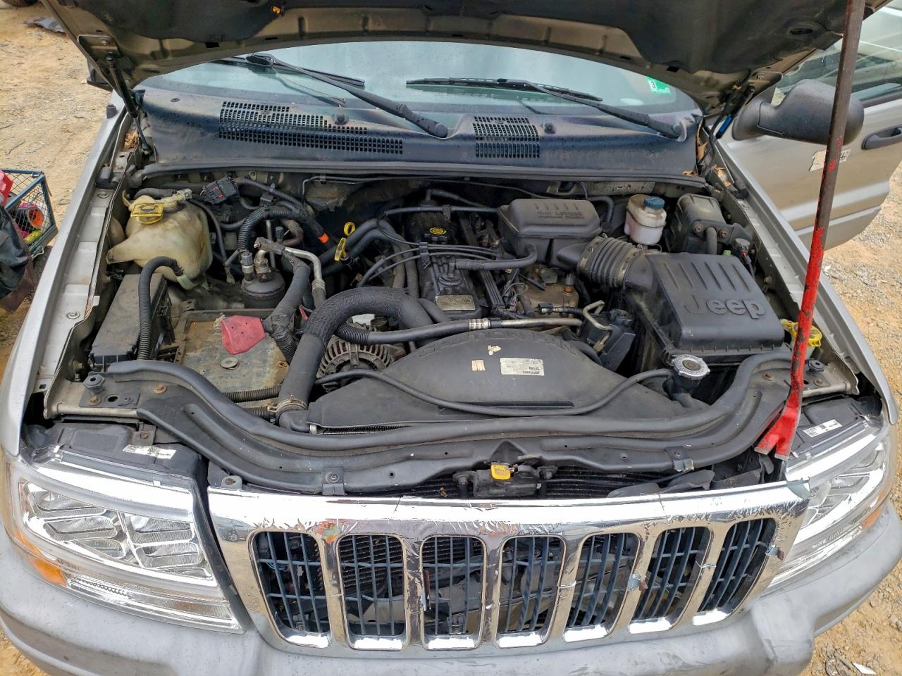 2000 Jeep Grand Cherokee Laredo VIN: 1J4GW48S0YC322734 Lot: 94291065