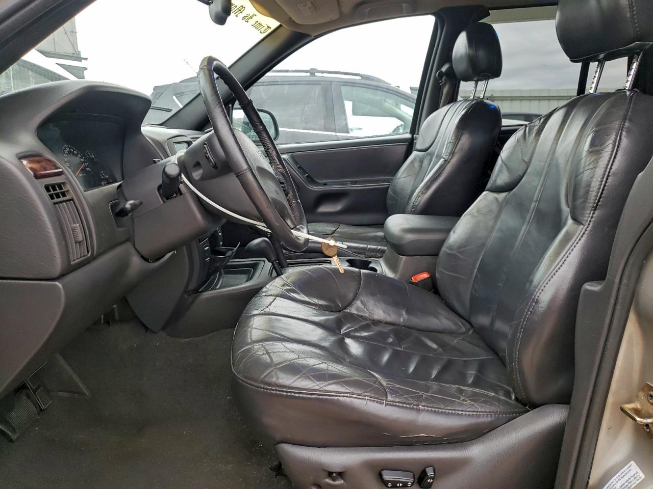 2000 Jeep Grand Cherokee Laredo VIN: 1J4GW48S0YC322734 Lot: 94291065