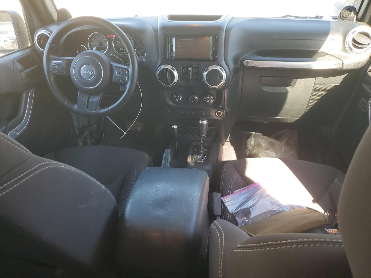 2014 Jeep Wrangler Unlimited Sahara VIN: 1C4BJWEG3EL283773 Lot: 91075655