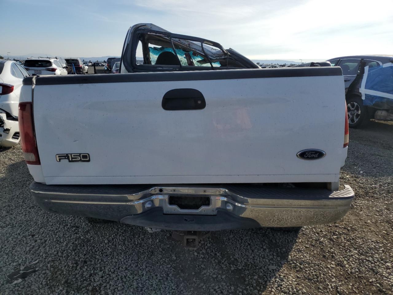 2000 Ford F150 VIN: 1FTRX18L3YKA63763 Lot: 91619515