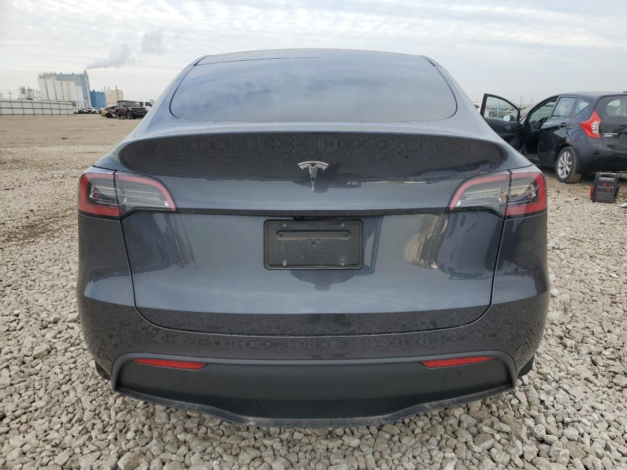 2025 Tesla Model Y VIN: 7SAYGDED4SA373998 Lot: 90707645
