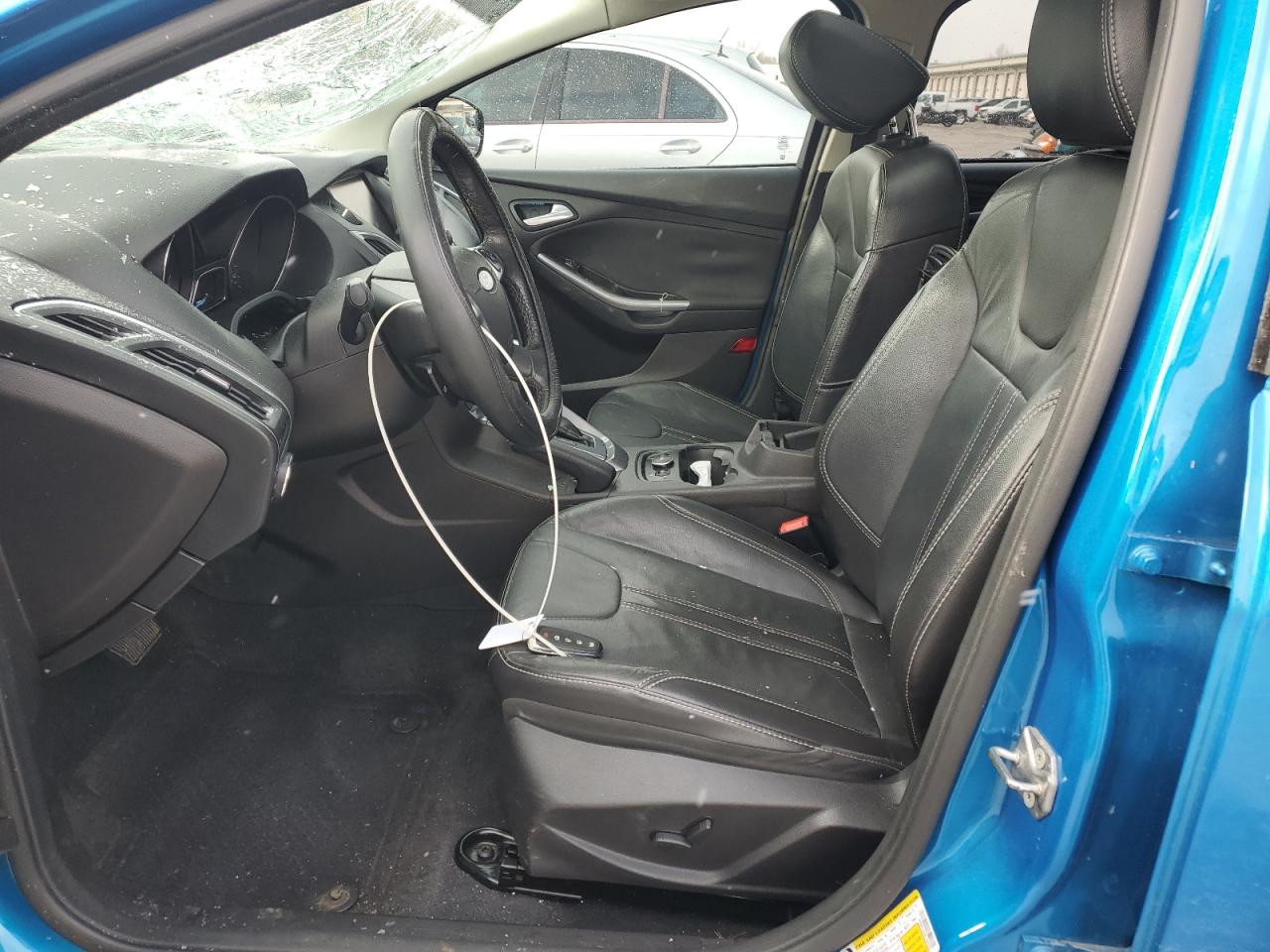 2014 Ford Focus Titanium VIN: 1FADP3J2XEL428703 Lot: 91910915