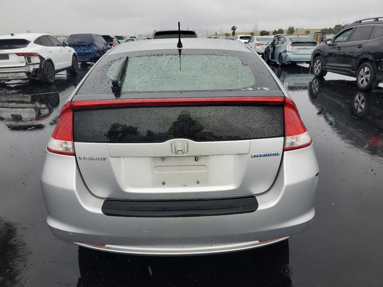 2010 Honda Insight Ex VIN: JHMZE2H73AS005431 Lot: 92595965