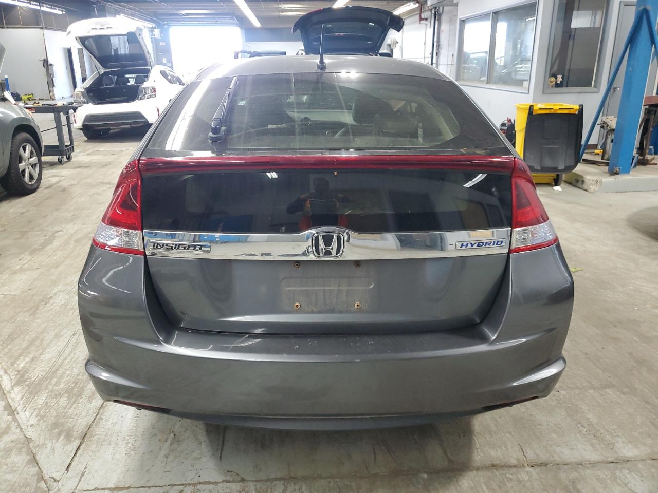 2014 Honda Insight Ex VIN: JHMZE2H70ES000919 Lot: 91530205