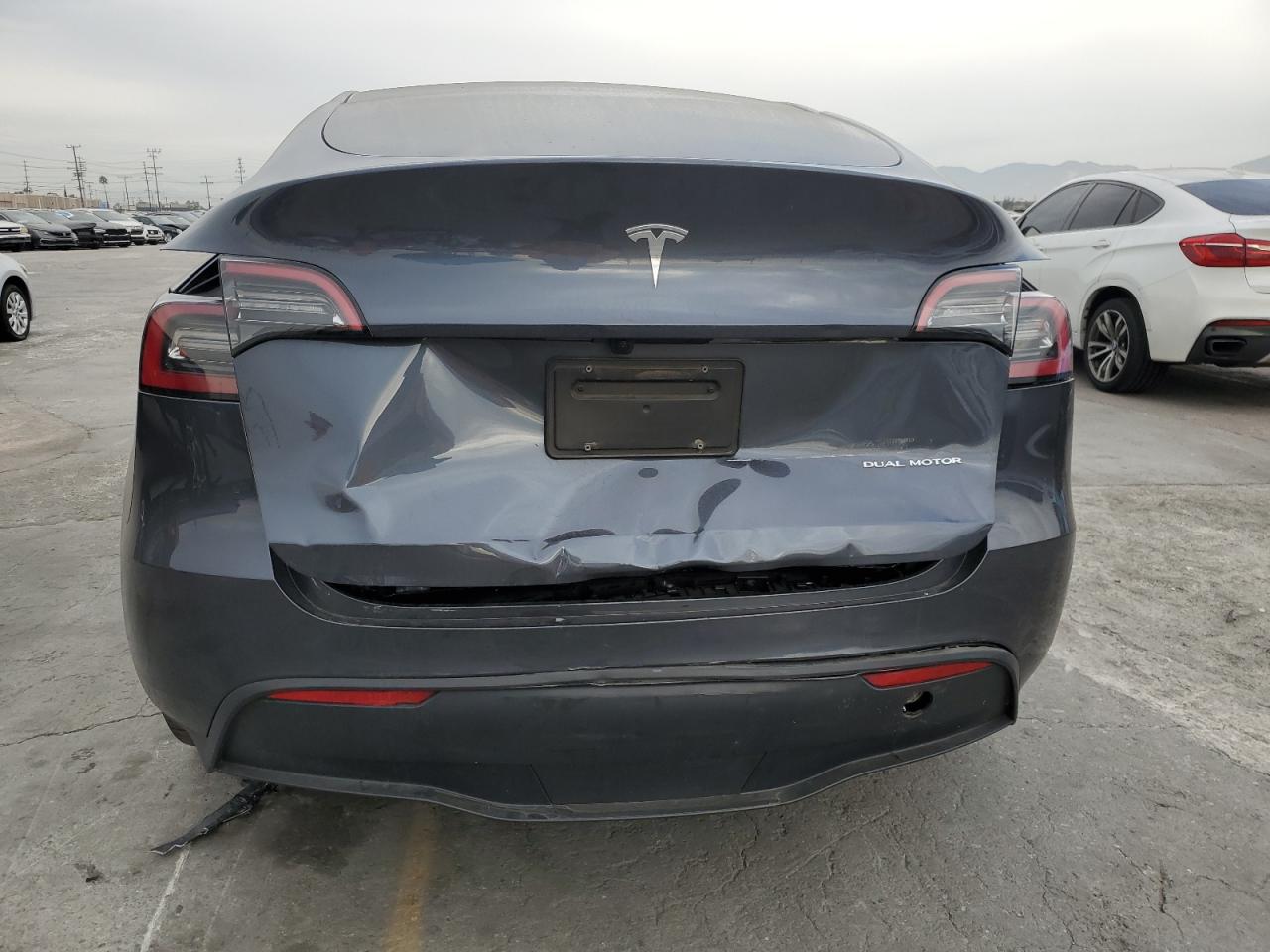 2023 Tesla Model Y VIN: 7SAYGDEE7PA209404 Lot: 92000725