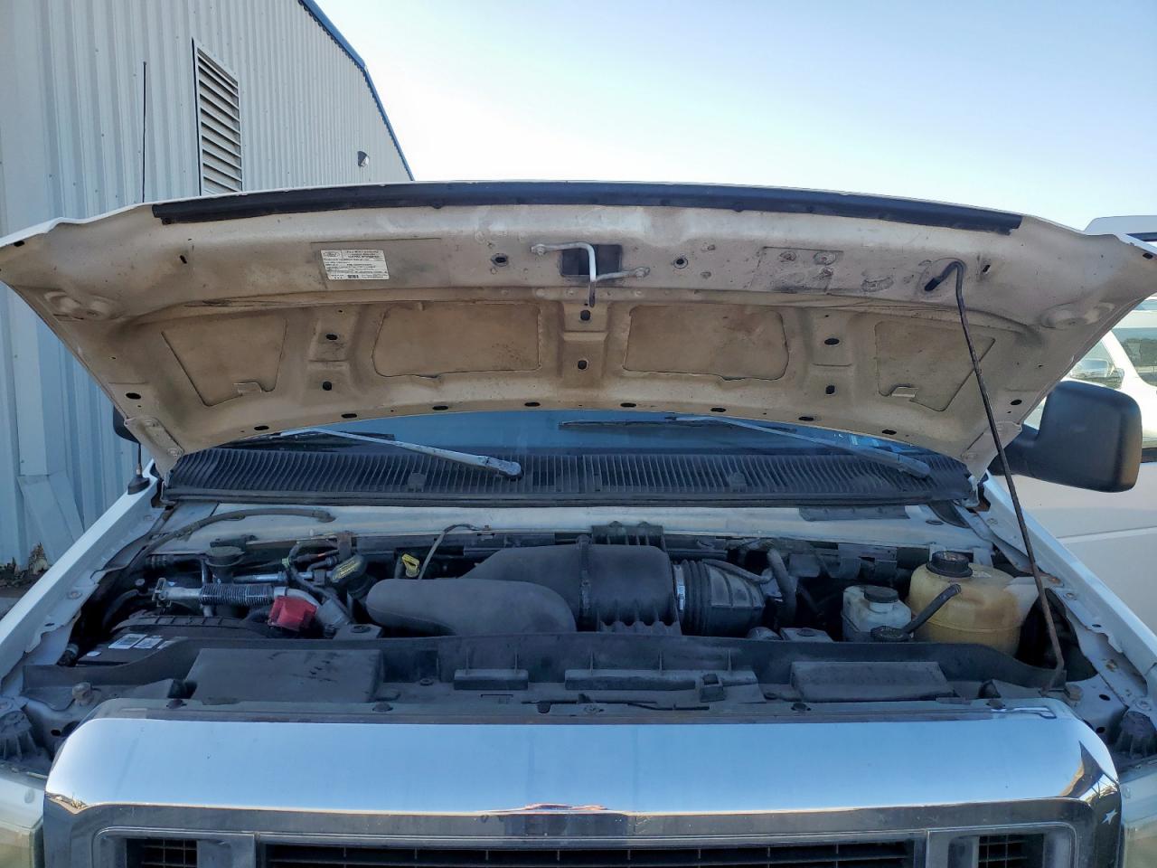 2009 Ford Econoline E350 Super Duty Wagon VIN: 1FBNE31L89DA27636 Lot: 92701035