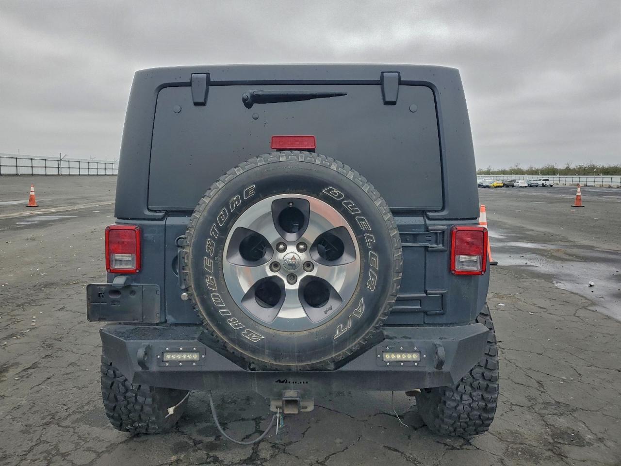 2016 Jeep Wrangler Unlimited Sahara VIN: 1C4BJWEG3GL217890 Lot: 94263755