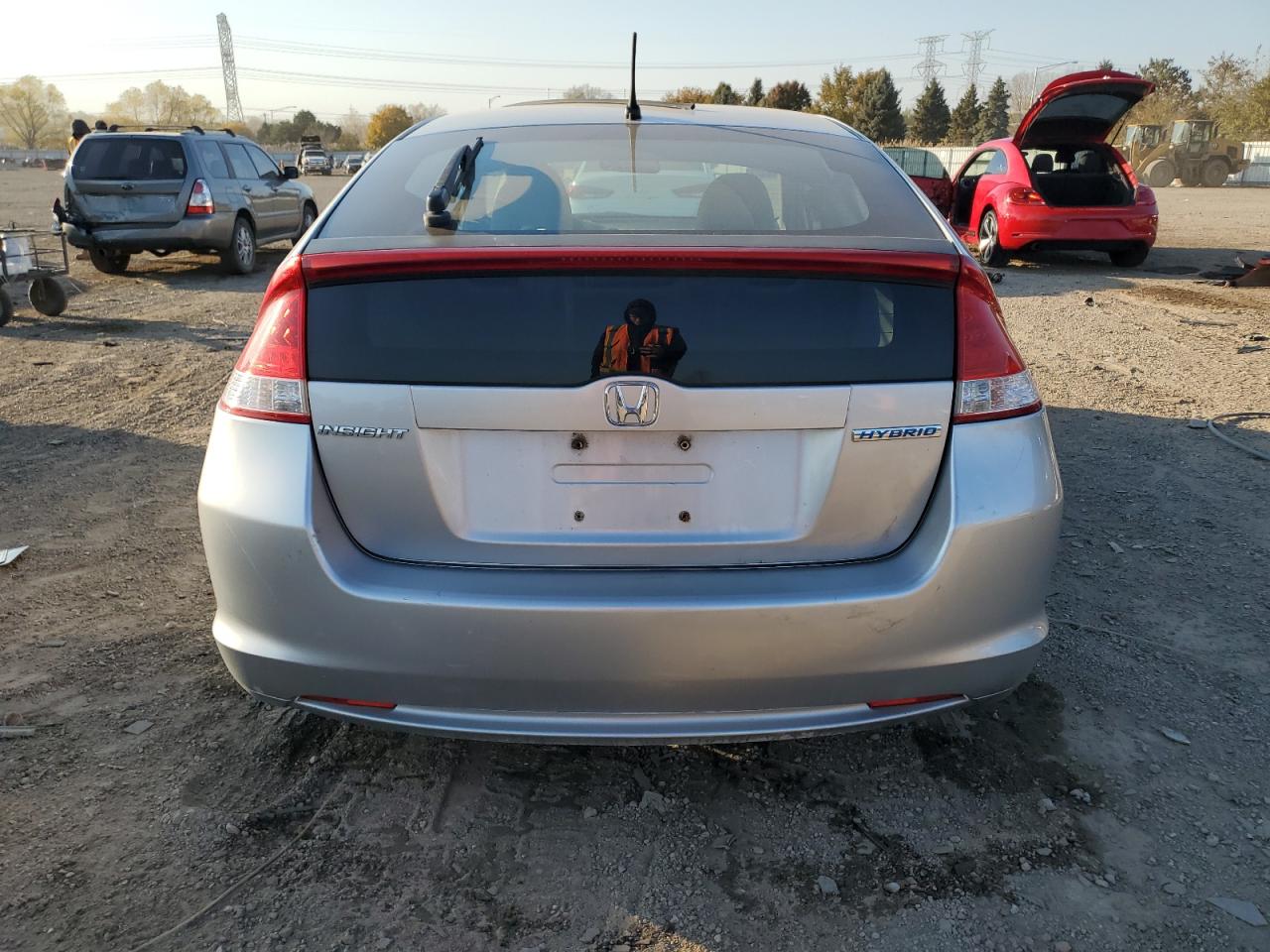 2010 Honda Insight Ex VIN: JHMZE2H71AS001927 Lot: 91524075