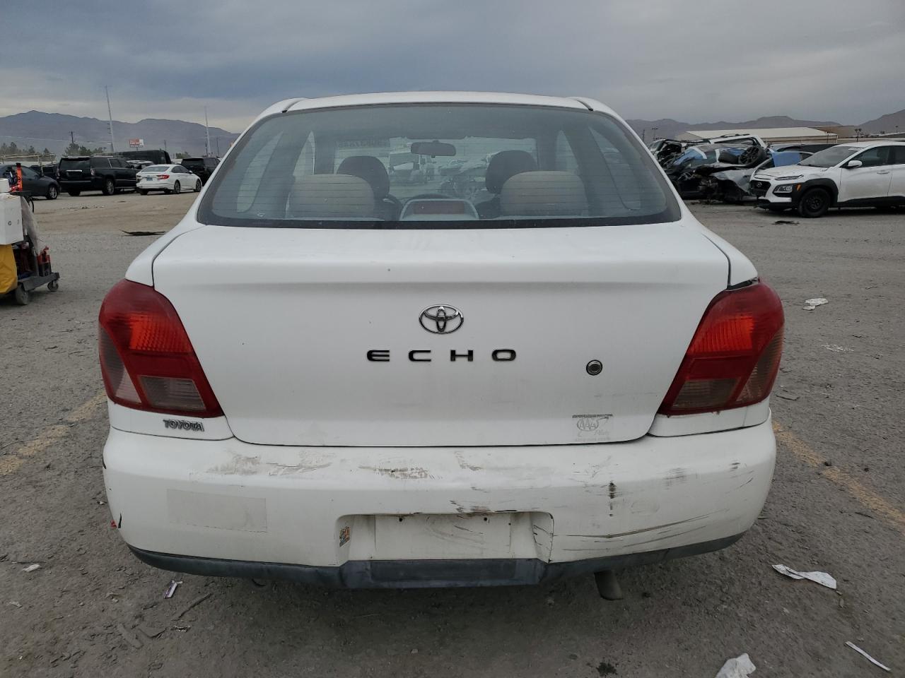 2001 Toyota Echo VIN: JTDAT123710196576 Lot: 90837845