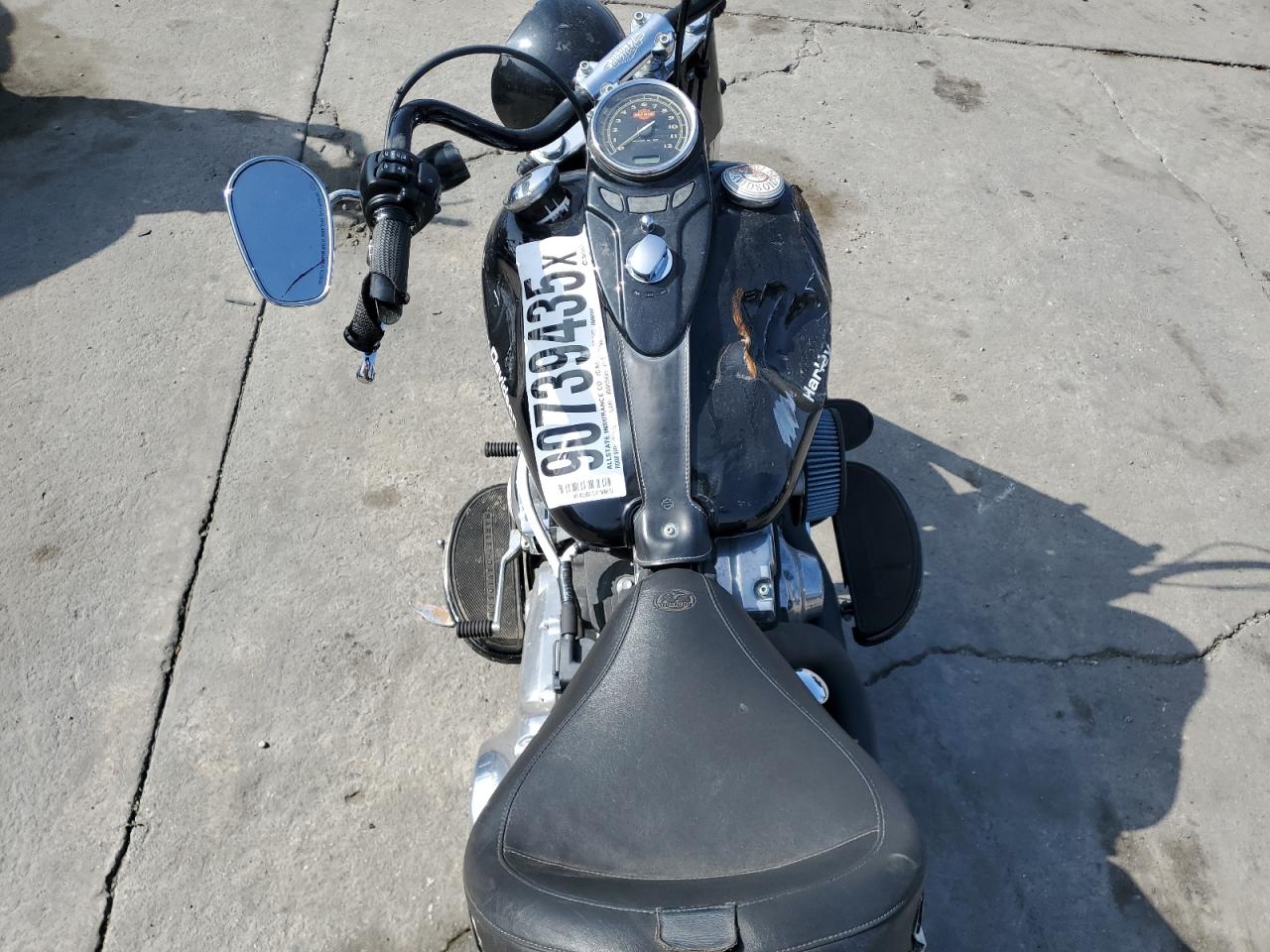 2013 Harley-Davidson Fls Softail Slim VIN: 1HD1JRV12DB011999 Lot: 90739435