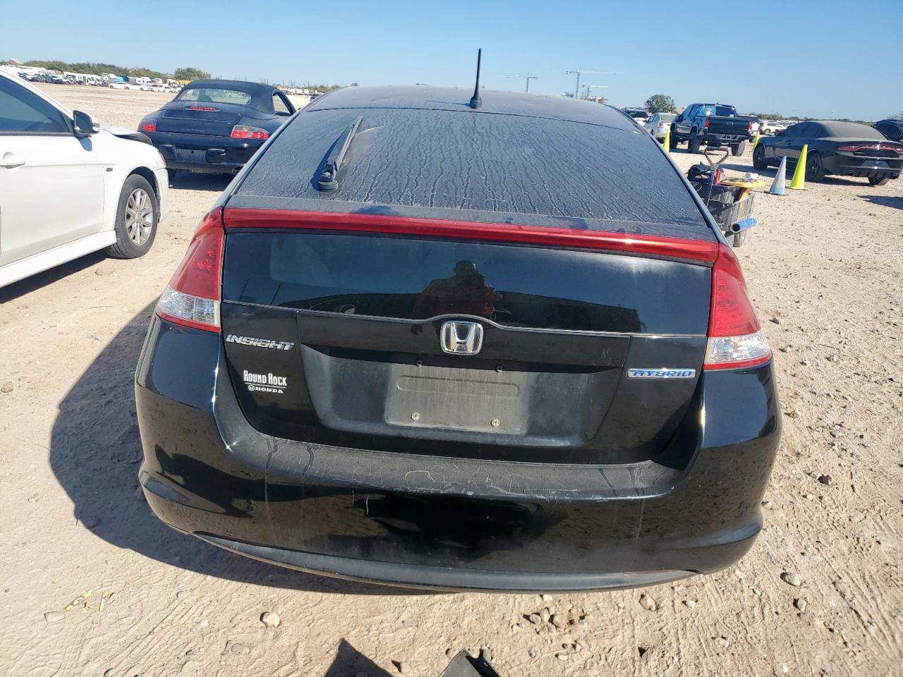 2010 Honda Insight Ex VIN: JHMZE2H77AS023821 Lot: 91120425