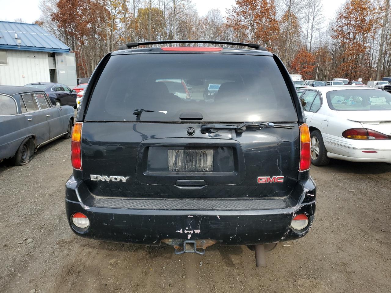 2003 GMC Envoy VIN: 1GKDT13SX32113477 Lot: 90837585