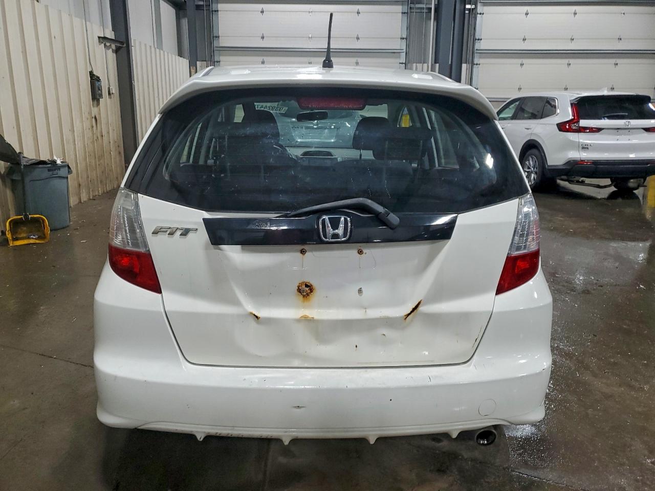 2009 Honda Fit Sport VIN: JHMGE88469S045109 Lot: 93924475