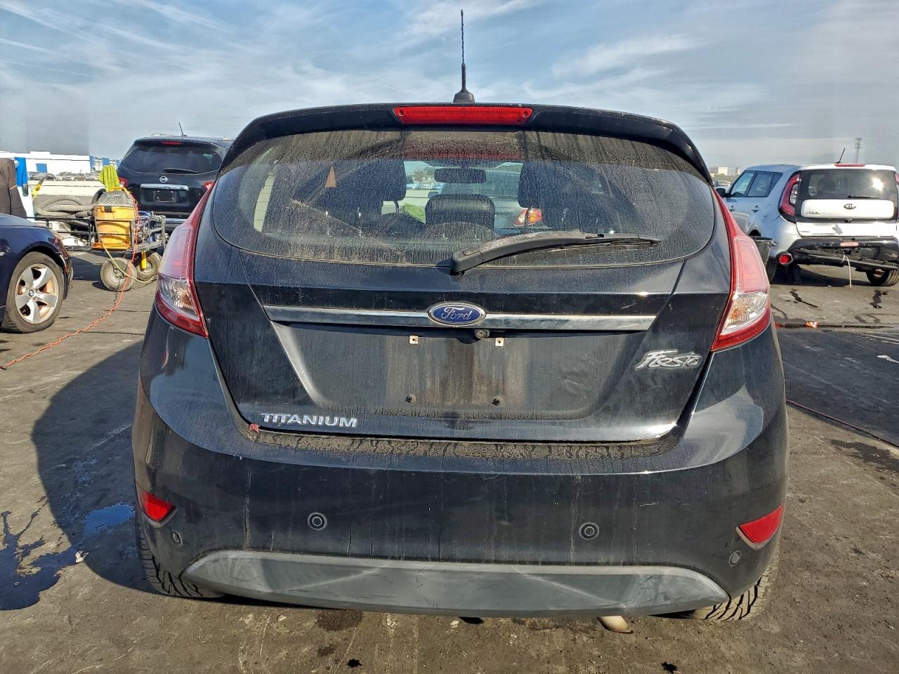 2016 Ford Fiesta Titanium VIN: 3FADP4FJ3GM203241 Lot: 94157255