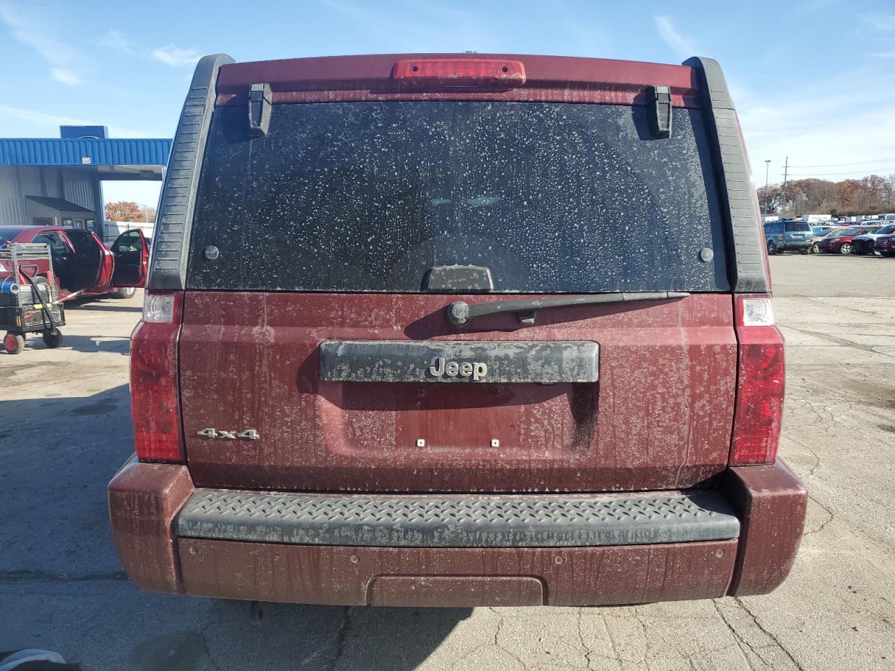 2007 Jeep Commander VIN: 1J8HG48K97C668974 Lot: 92597005