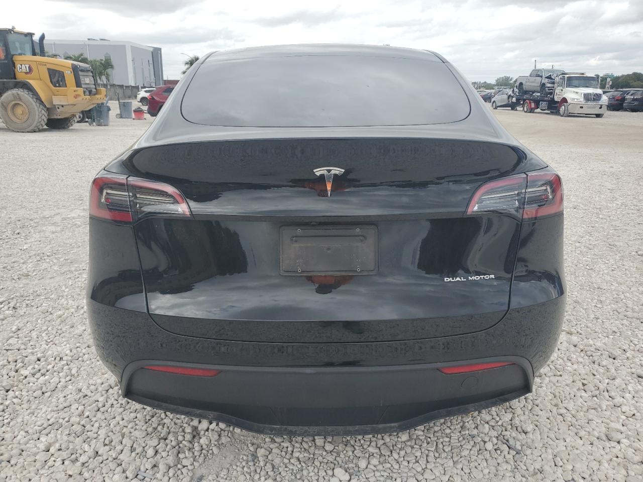 2023 Tesla Model Y VIN: 7SAYGDEE8PA167096 Lot: 91211235