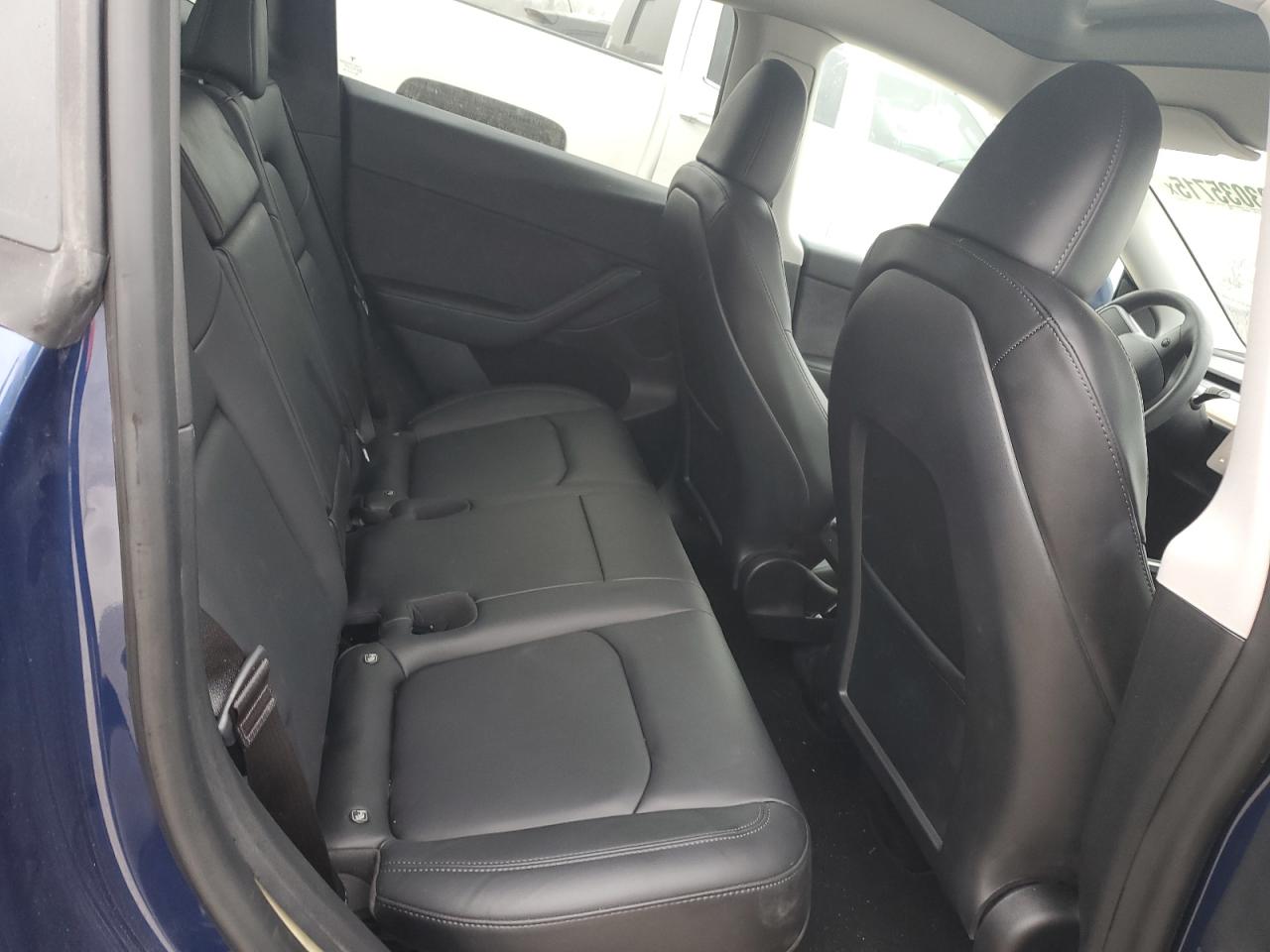 2023 Tesla Model Y VIN: 7SAYGDEE2PF748130 Lot: 93035715