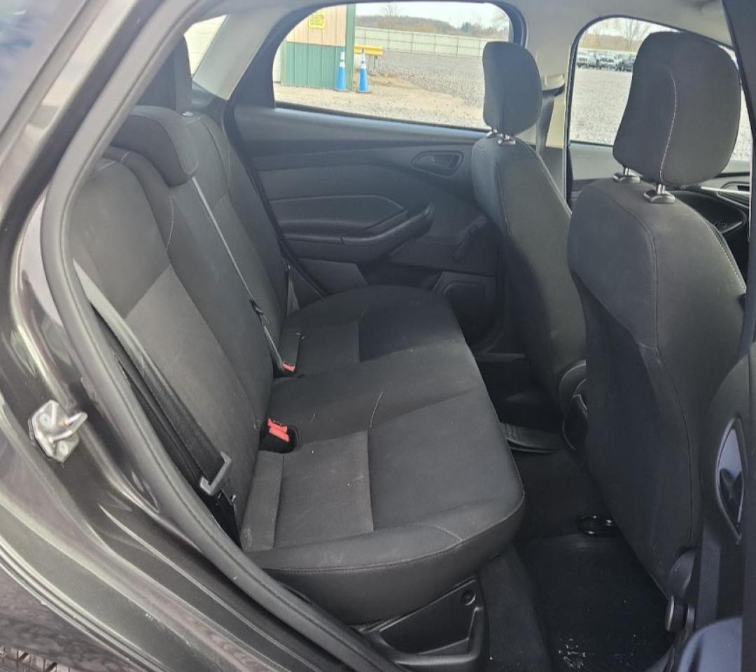 2015 Ford Focus S VIN: 1FADP3E26FL299967 Lot: 92740625