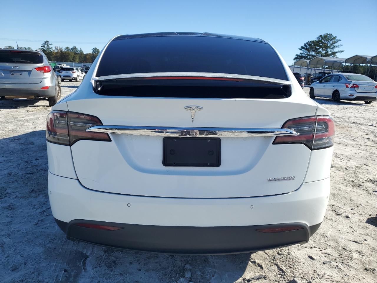 2021 Tesla Model X VIN: 5YJXCDE41MF311064 Lot: 90702725