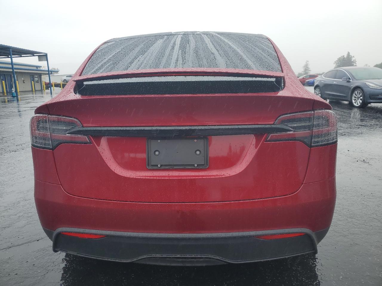 2026 Tesla Model X VIN: 7SAXCBE57TF473604 Lot: 91318105